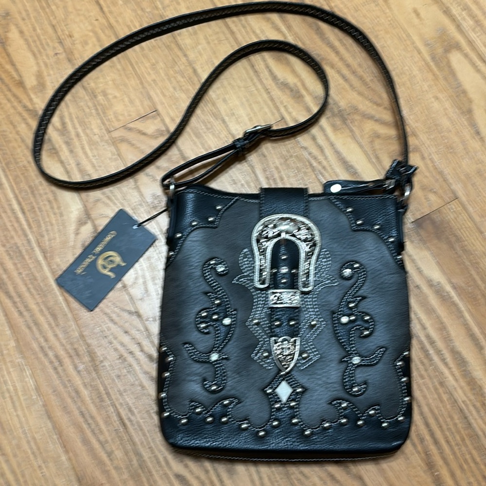 Cute western style purse, new with tags. Approximately 9.5 by 10.